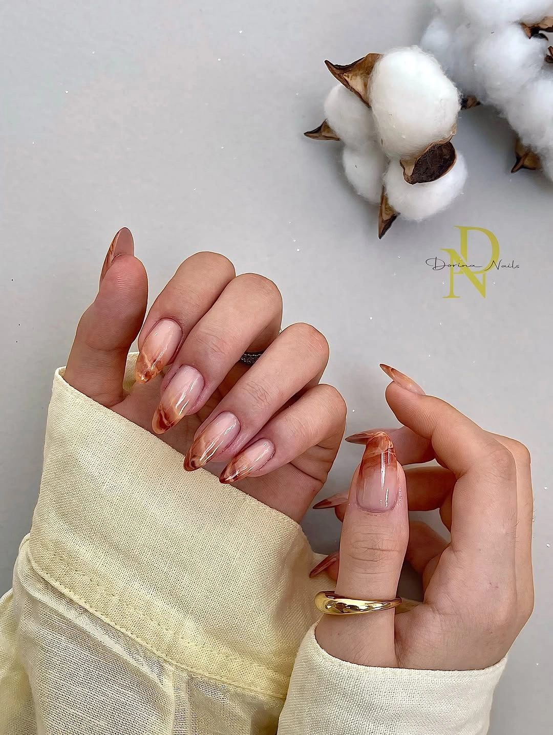 September nails color 2026 Translucent Amber Almond Tips With A Bare Base