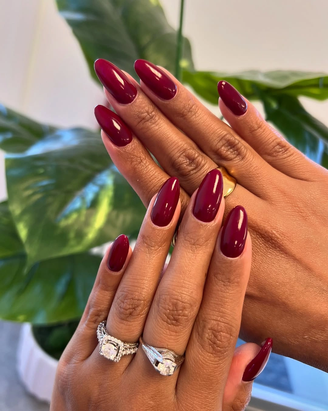 September nails color 2026 Glossy Deep Berry Almond Nails