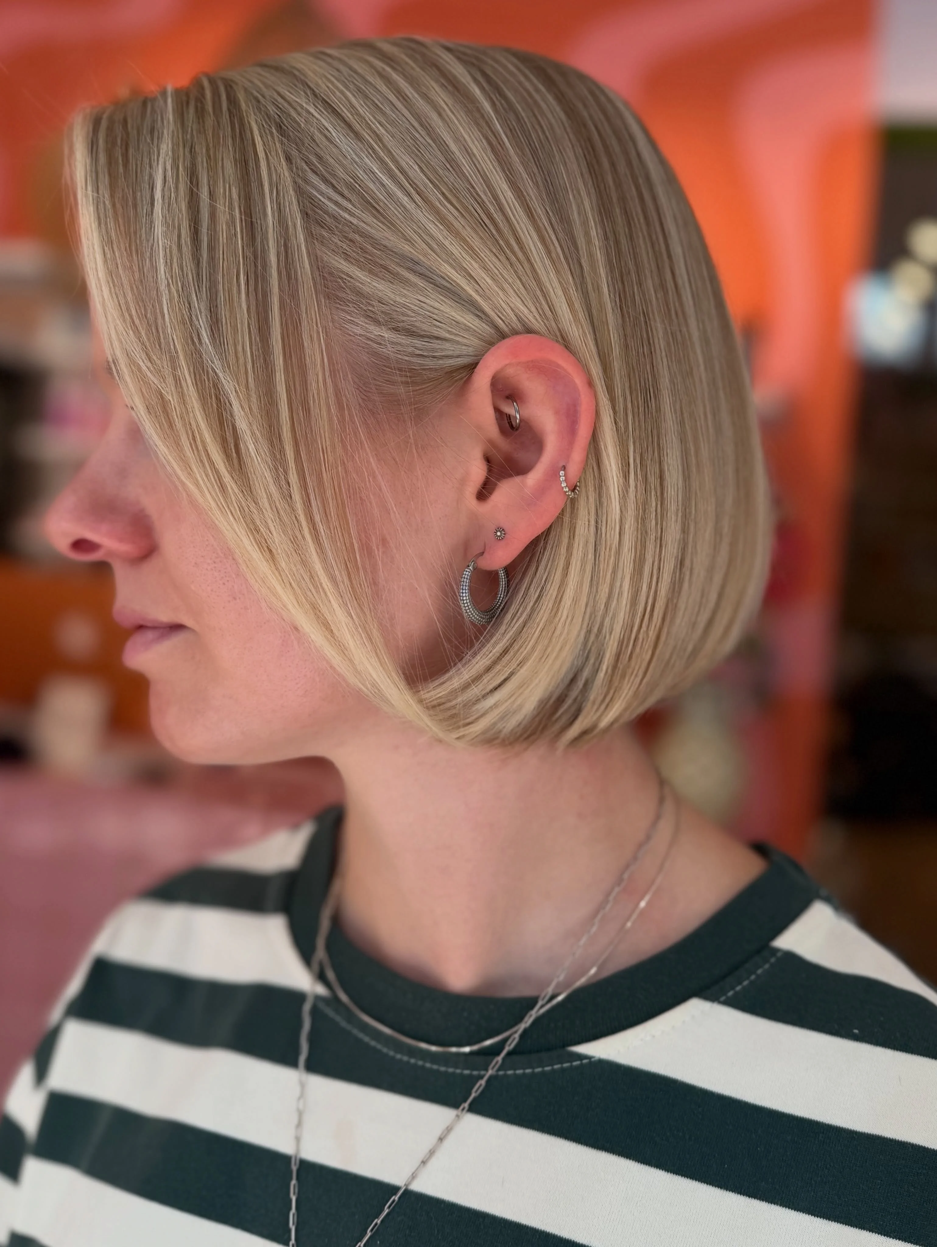 short bobbed hairstyle Glossy Precision Bob With Sleek Side Part