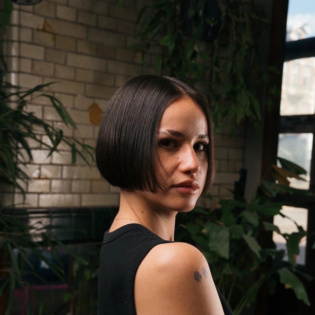 short bobbed hairstyle Minimalist Chin-Length Bob With Glass Hair Finish