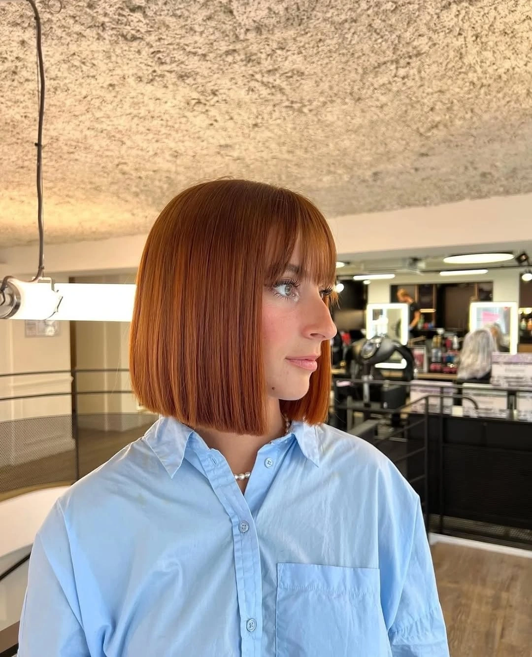 short bobbed hairstyle Classic Copper Precision Bob With Full Bangs