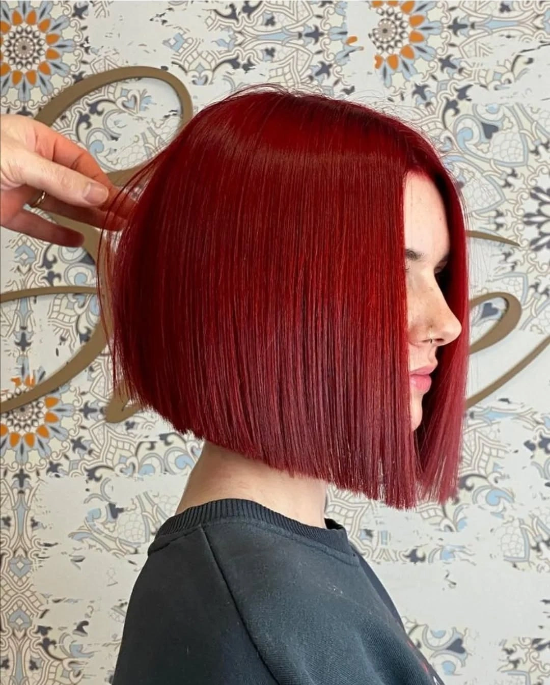 short bobbed hairstyle Bold Ruby Glass Bob With Architectural Lines