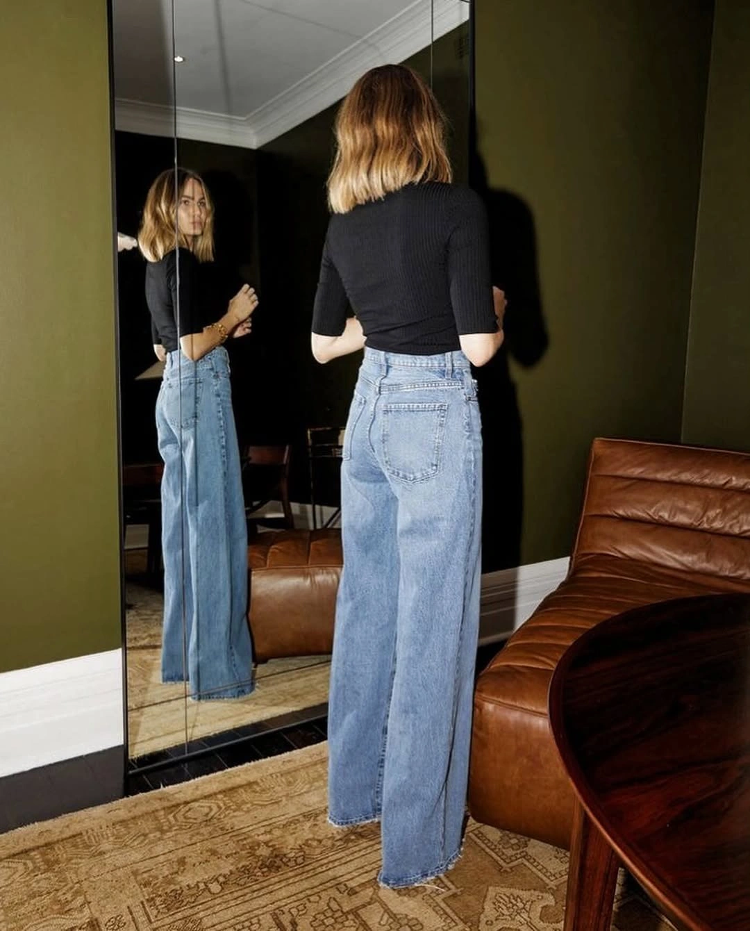 wide leg jeans outfit fall 2026 Minimal Black Knit With Timeless Wide-Leg Denim