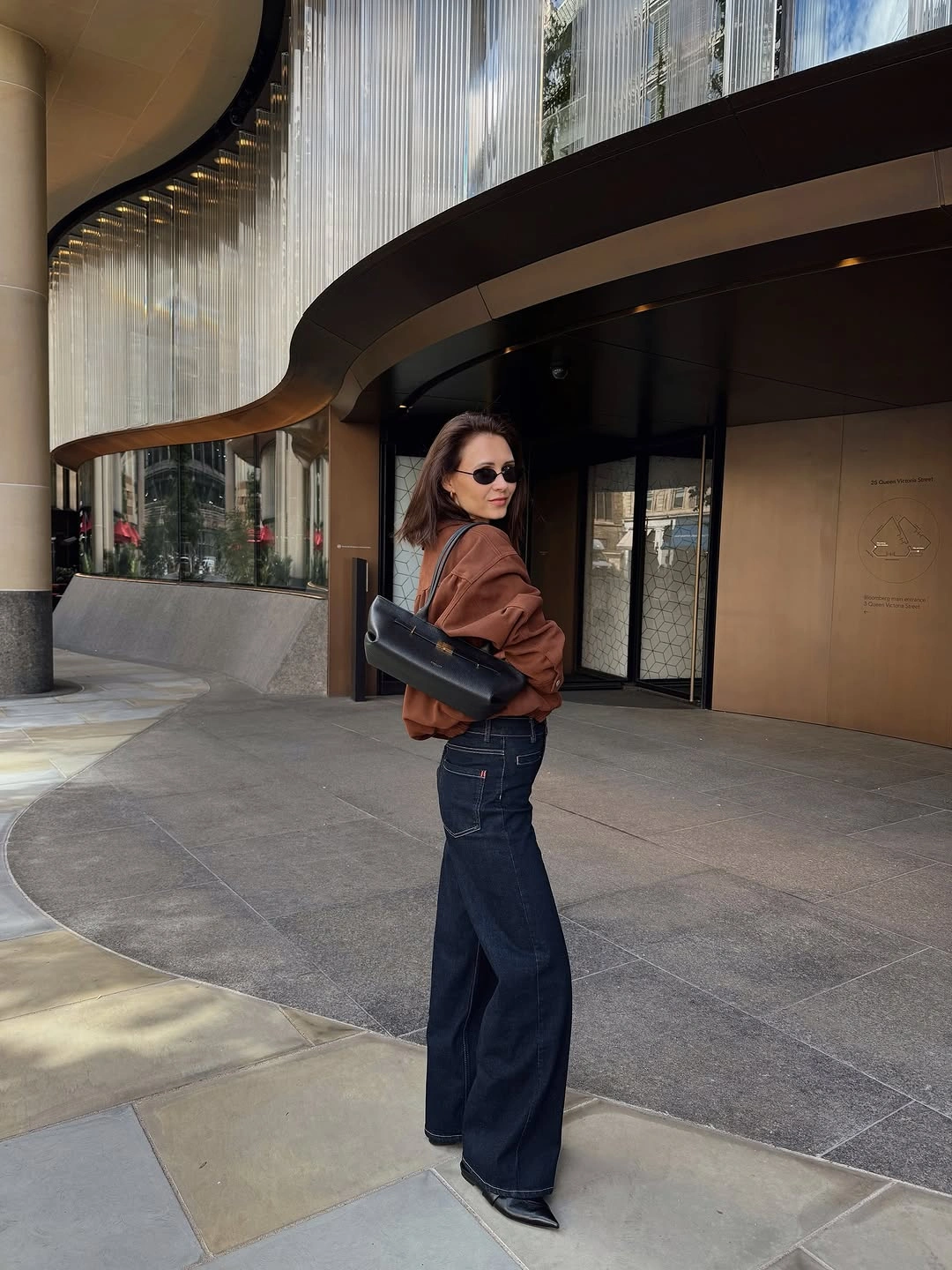 wide leg jeans outfit fall 2026 Dark Wash Wide-Leg Jeans With Modern City Sophistication