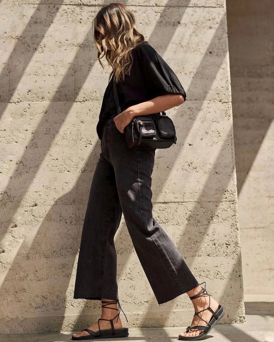 wide leg jeans outfit fall 2026 Dark Denim and Black Layers for Elevated Evenings