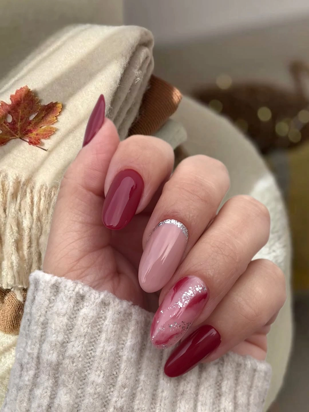 Long almond nails in pink plum burgundy and glittery rose tones