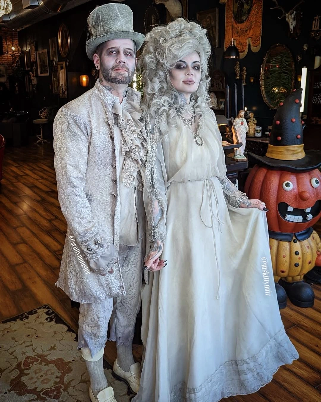 Victorian ghost bride and groom Halloween costumes in pale white clothing