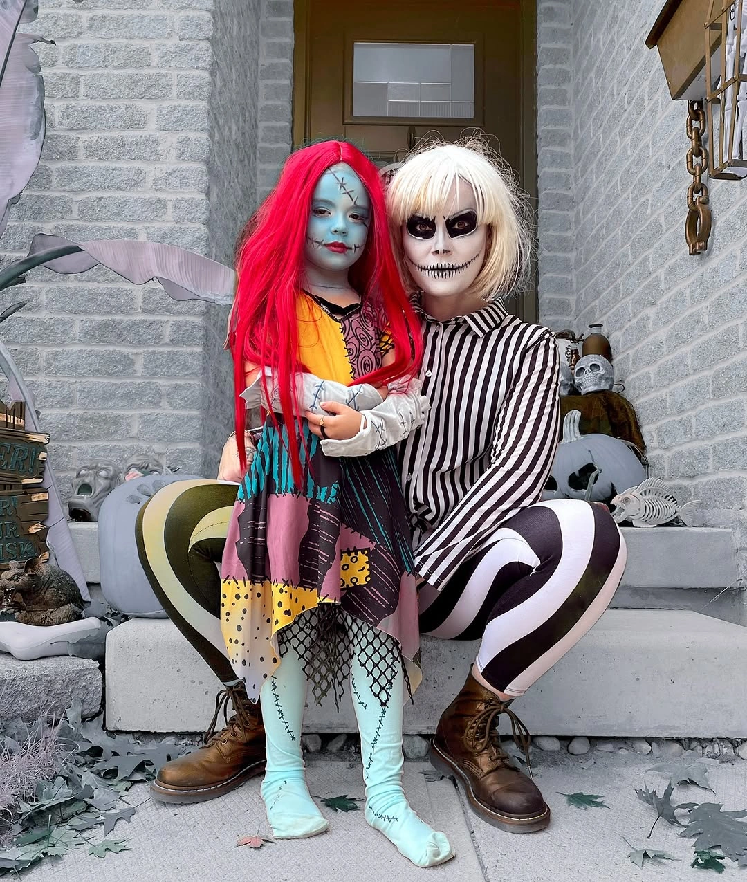 Sally and Beetlejuice Halloween costumes with patchwork dress and striped suit
