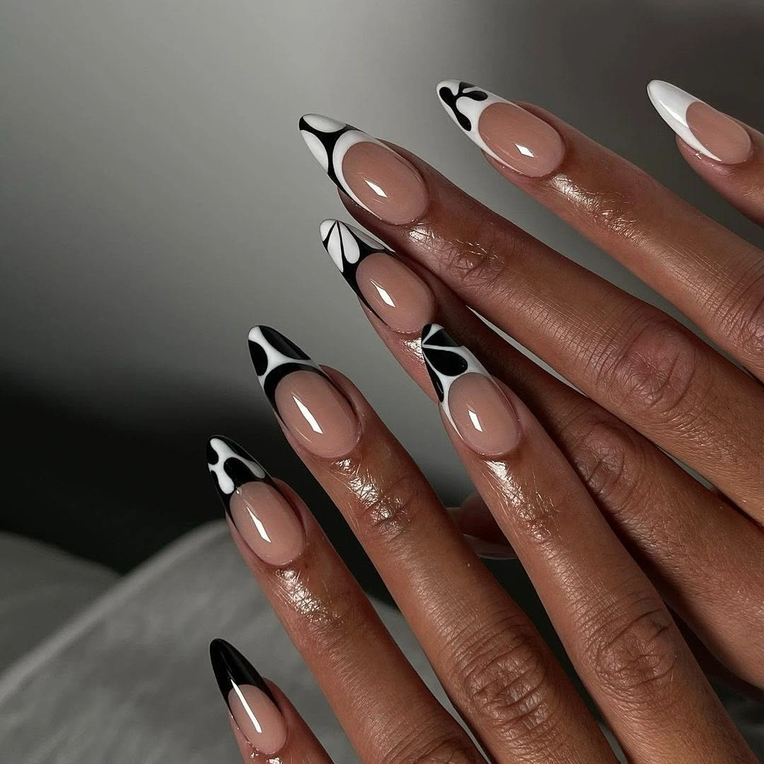 Long almond nails with black and white graphic French points