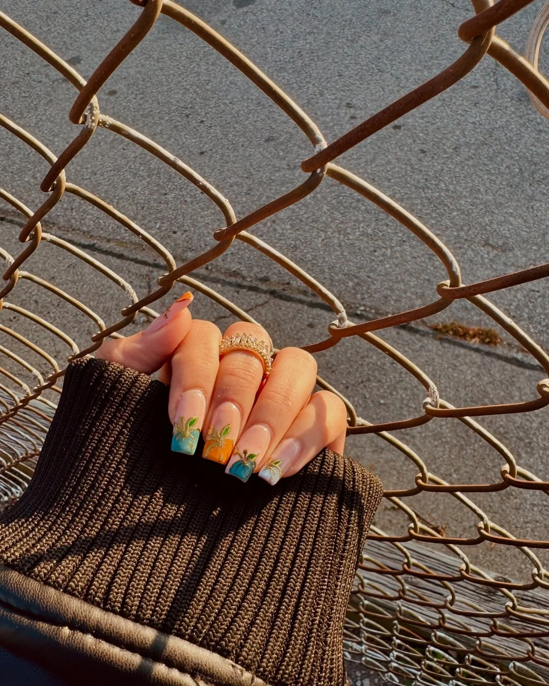 Medium square nails with neutral bases and colorful autumn accents