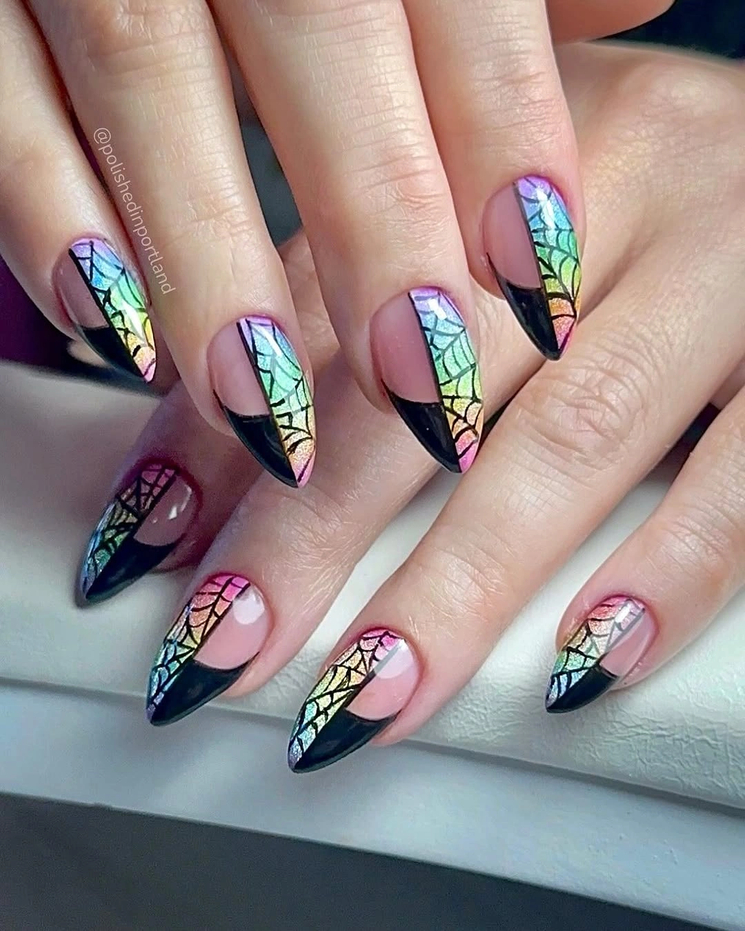 Long pointed nails with black frames and multicolor panels