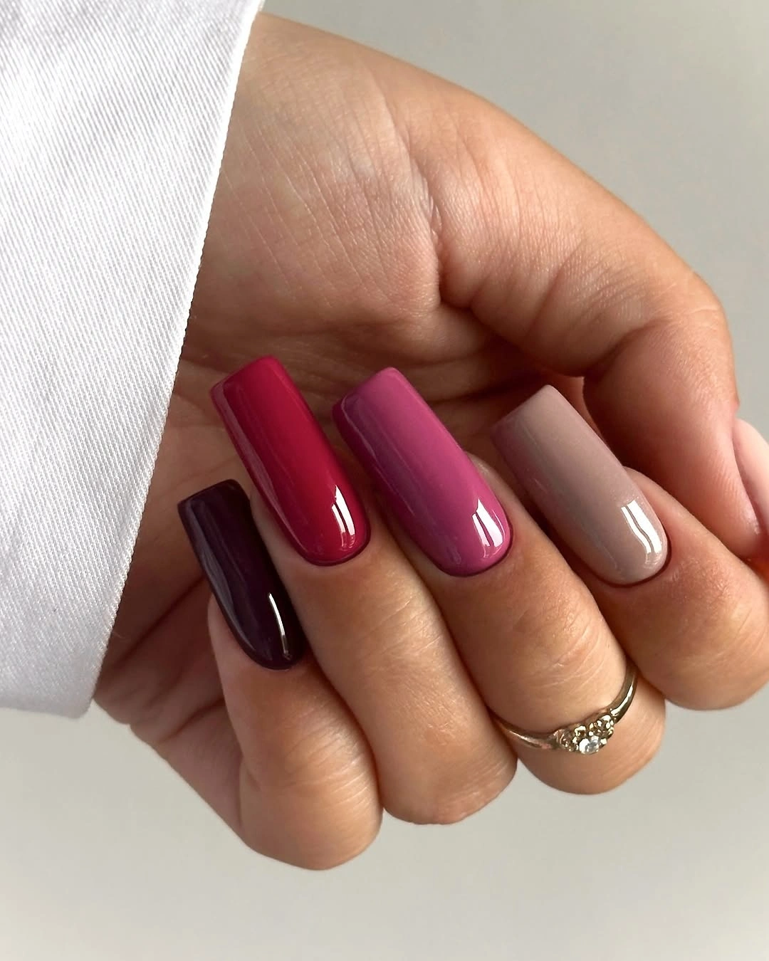 Medium square nails in tonal berry and mauve shades