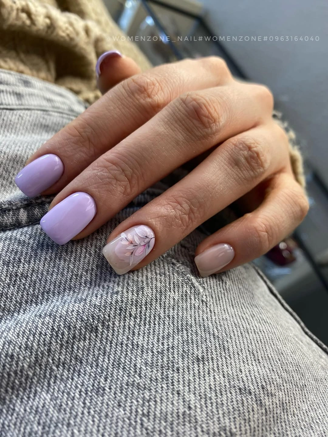 Lavender rounded-square nails with one delicate floral accent
