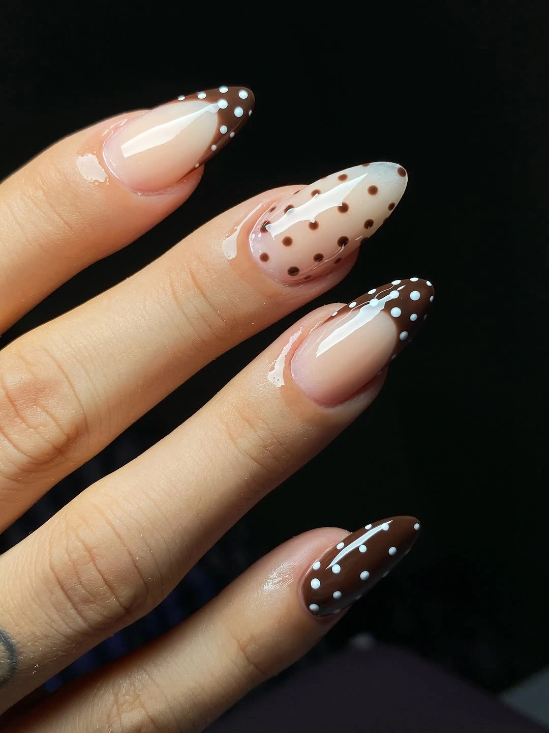 Long almond nails with brown dotted french tips