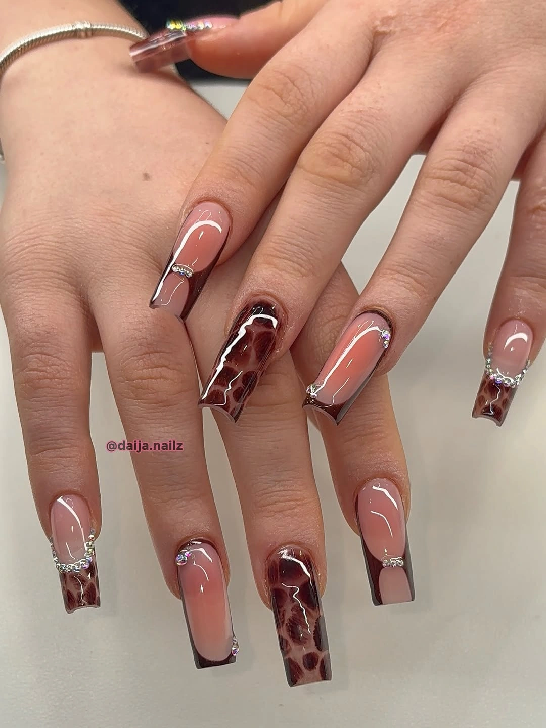 Long square nails with brown marble french tips