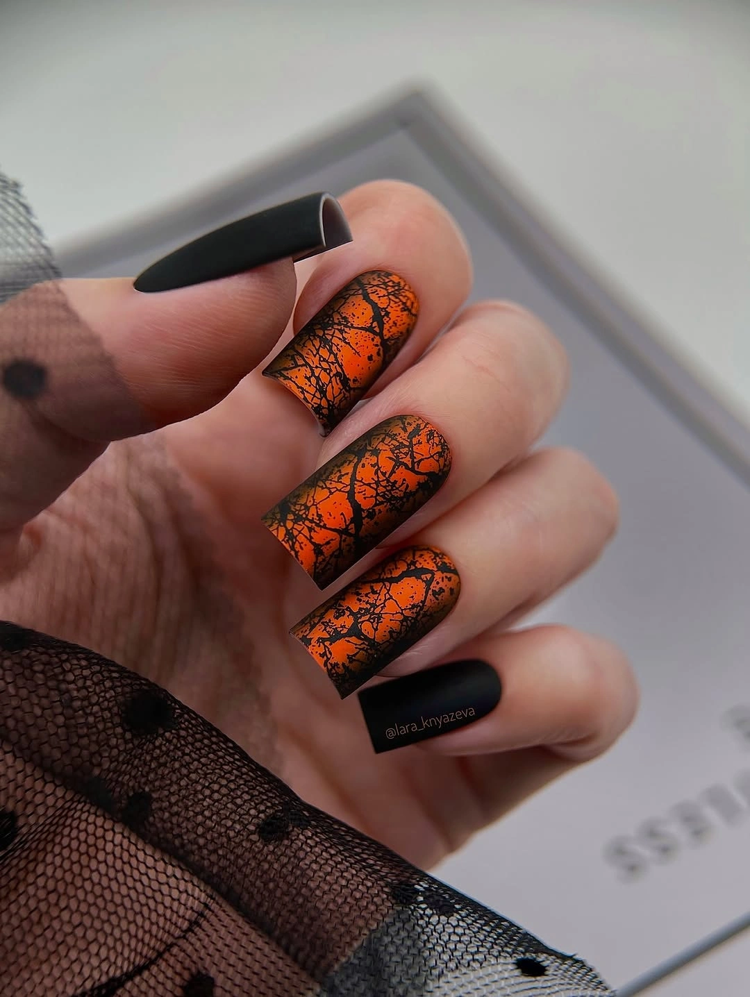 Matte black coffin nails with orange fall accents
