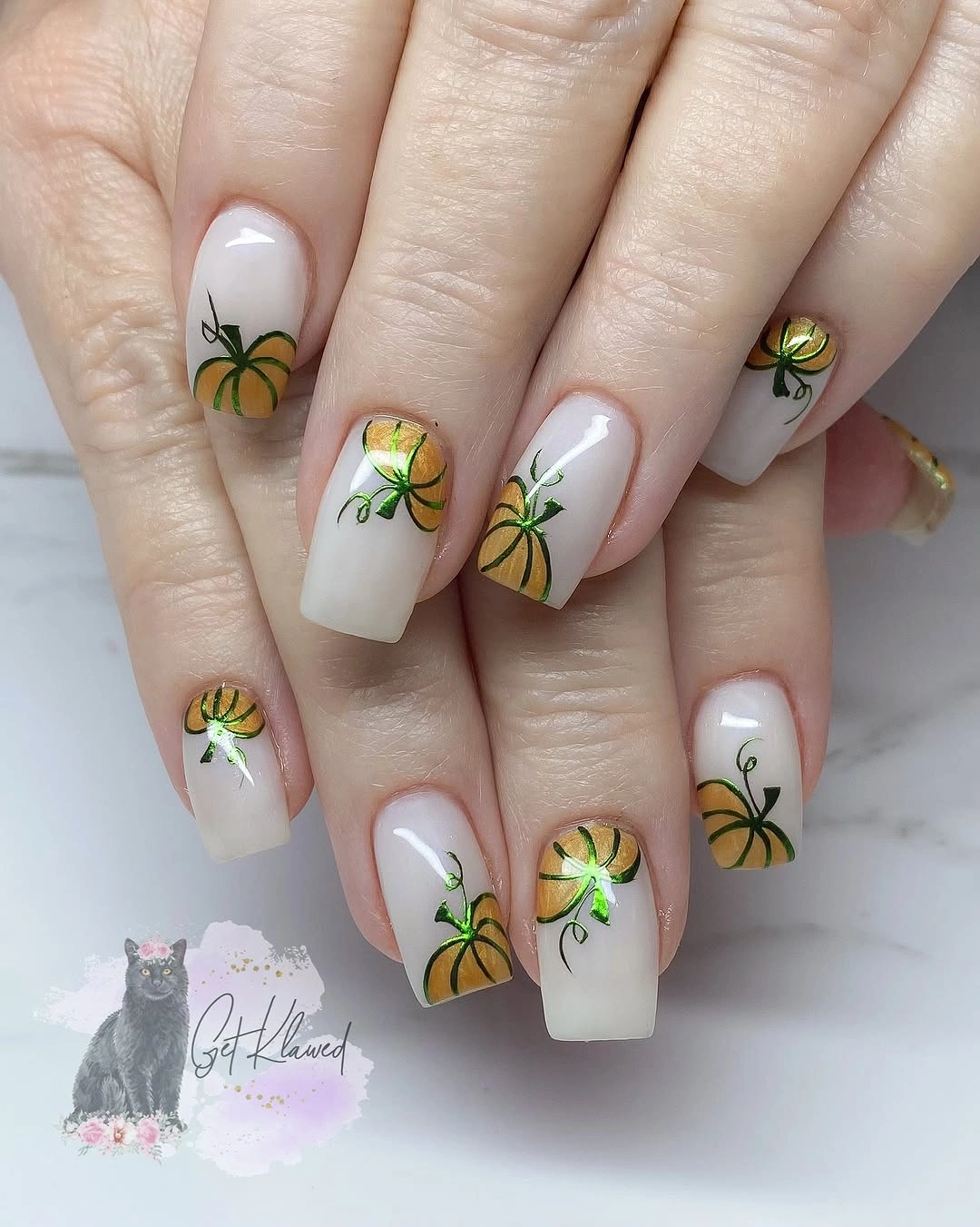 Cream square nails with yellow fall flower accents