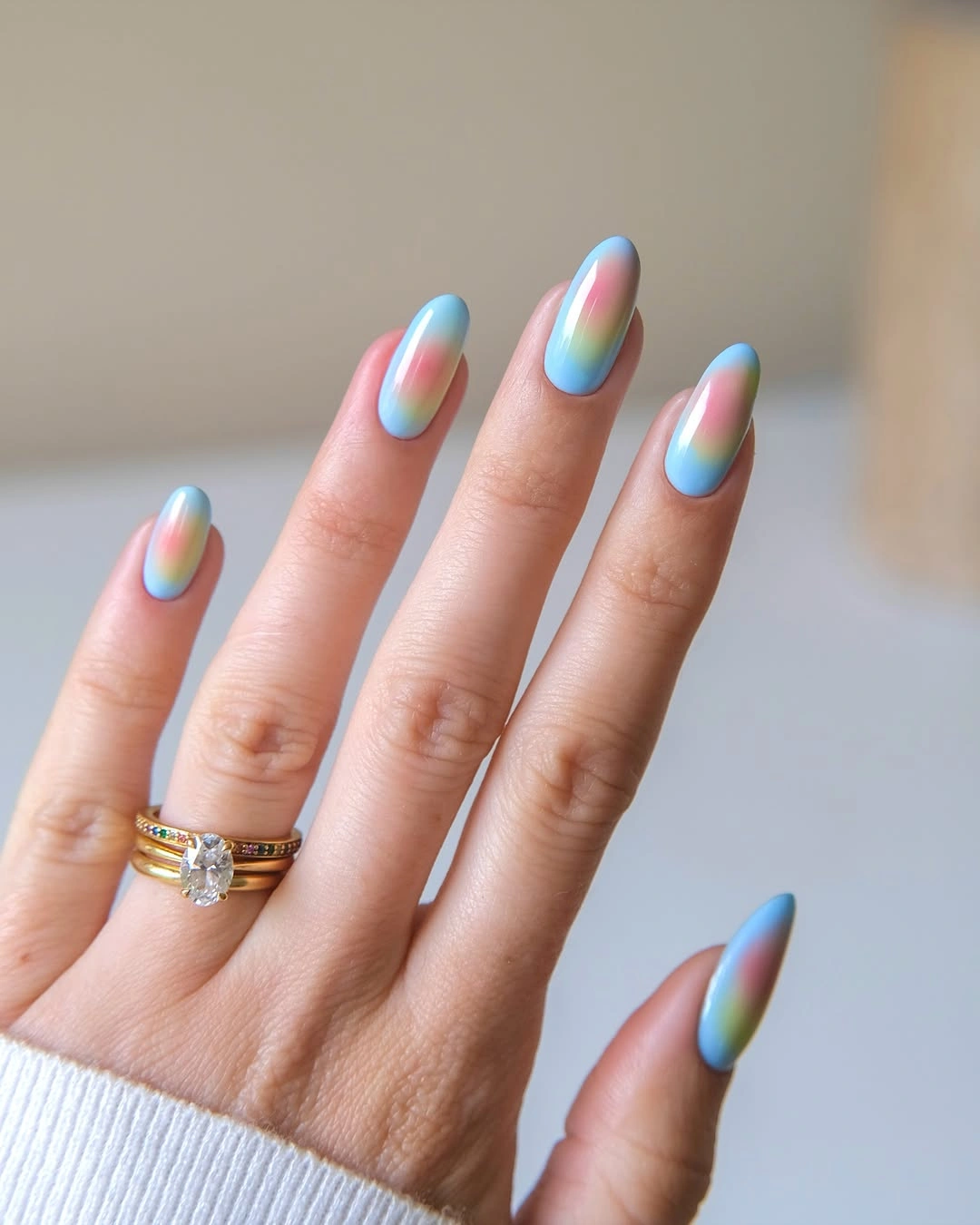 pastel aura almond nails with blue pink and green