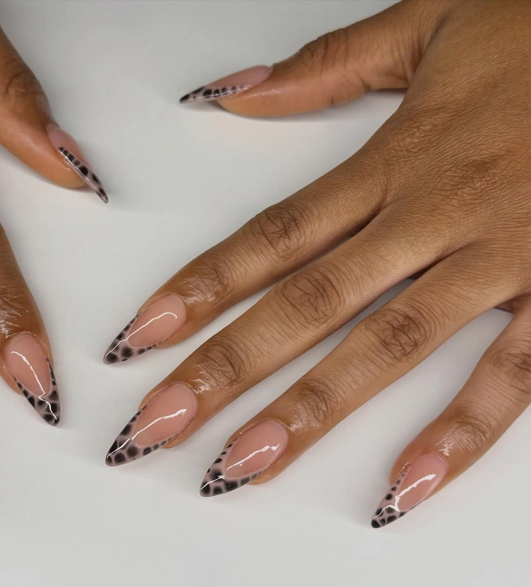 nude almond nails with smoky animal print French tips