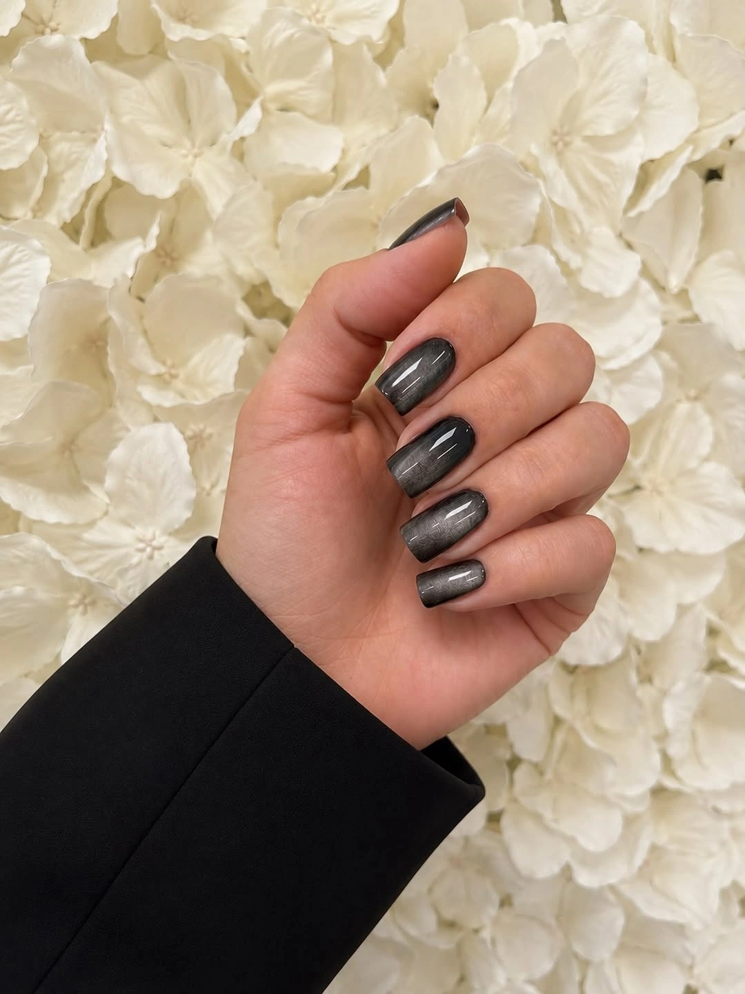 Short rounded gunmetal nails with smoky metallic shine