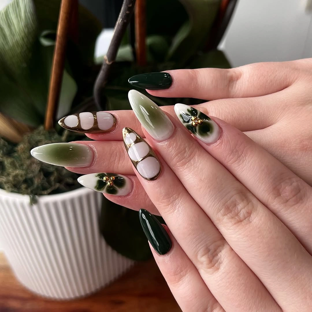 Long pointed nails in olive green blush cream and fine botanical-like details