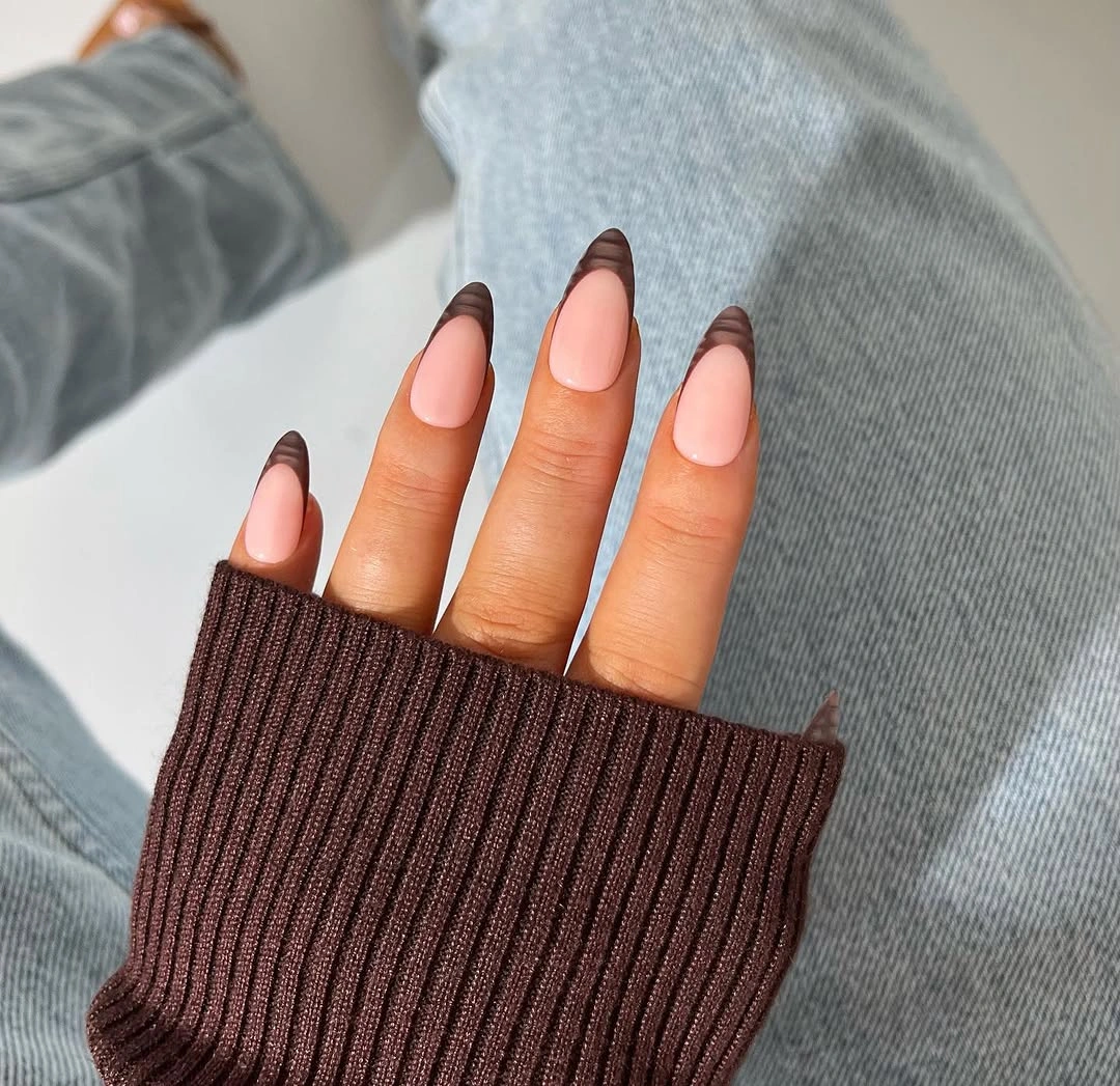 Medium almond nails with clean chocolate brown French tips