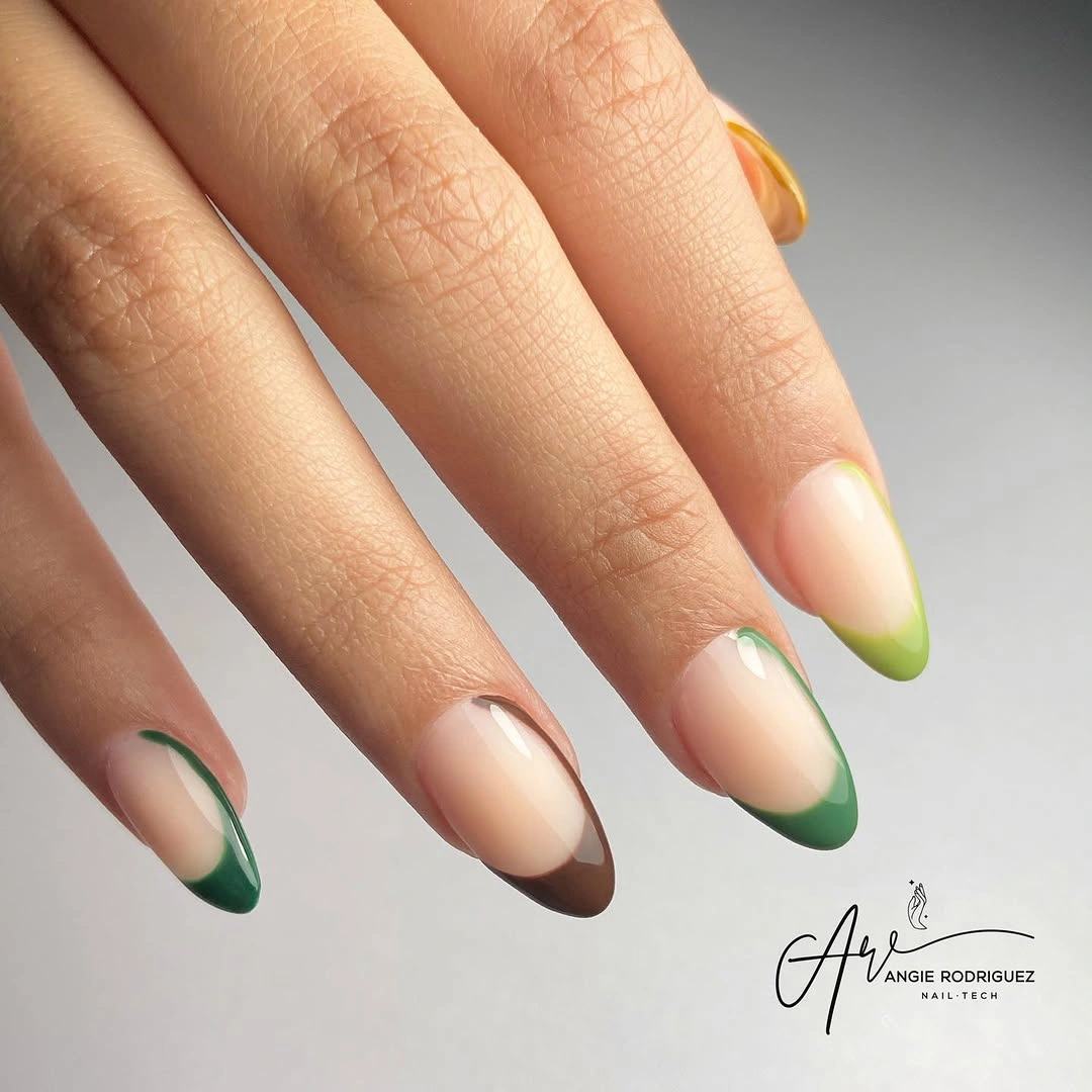 Pale almond nails with sage green and espresso French tips