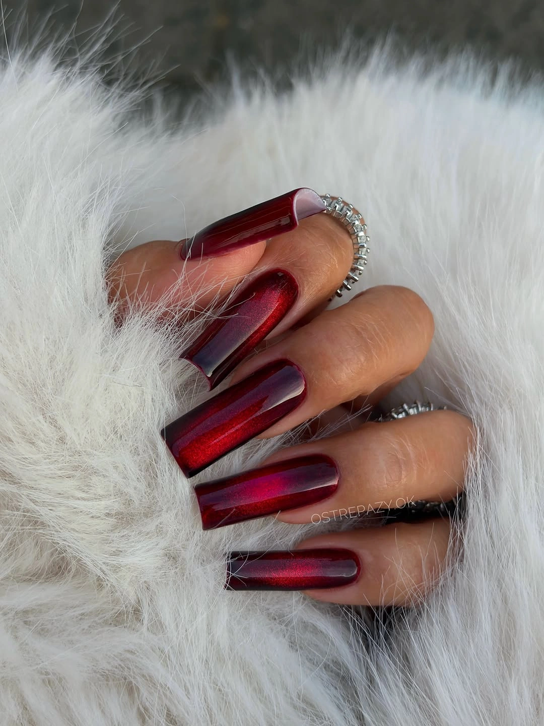 Long square burgundy-red nails with reflective chrome shine