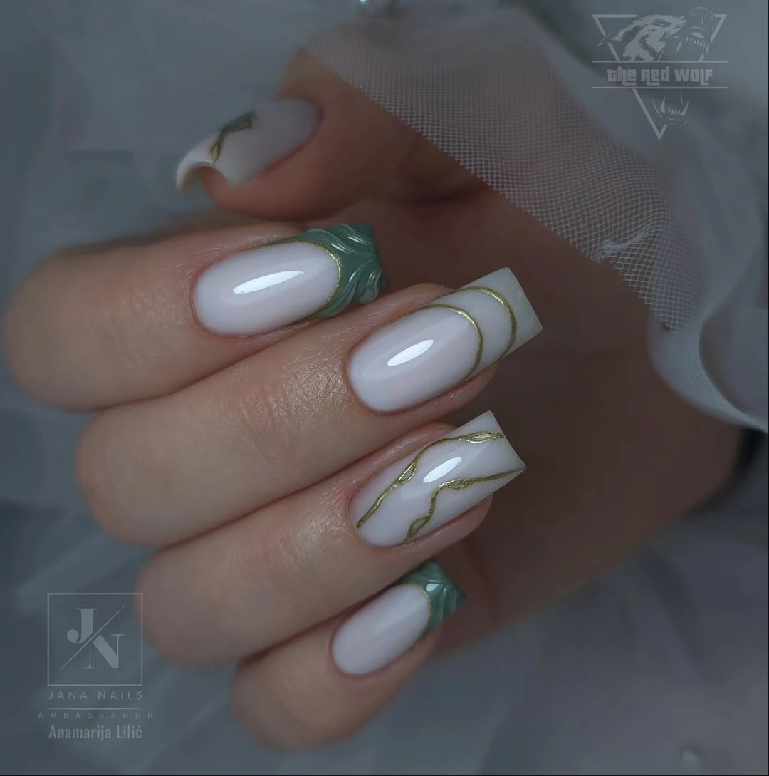 Long milky blue white nails with subtle pale green edging