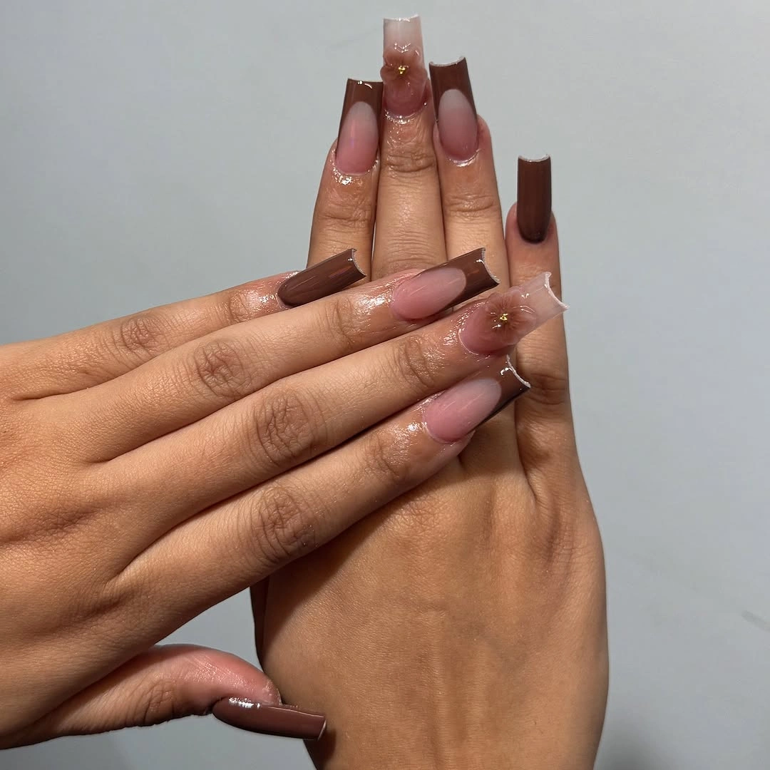 Long square nails with brown blush and subtle glitter accents