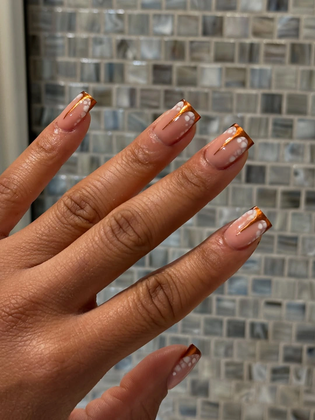 Clear nude square nails with thin copper French outlines