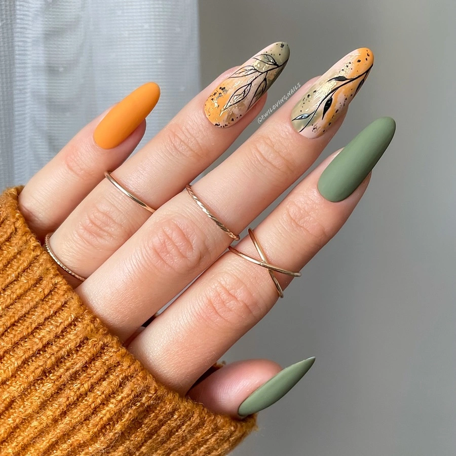 Long almond nails mixing orange olive and botanical line art