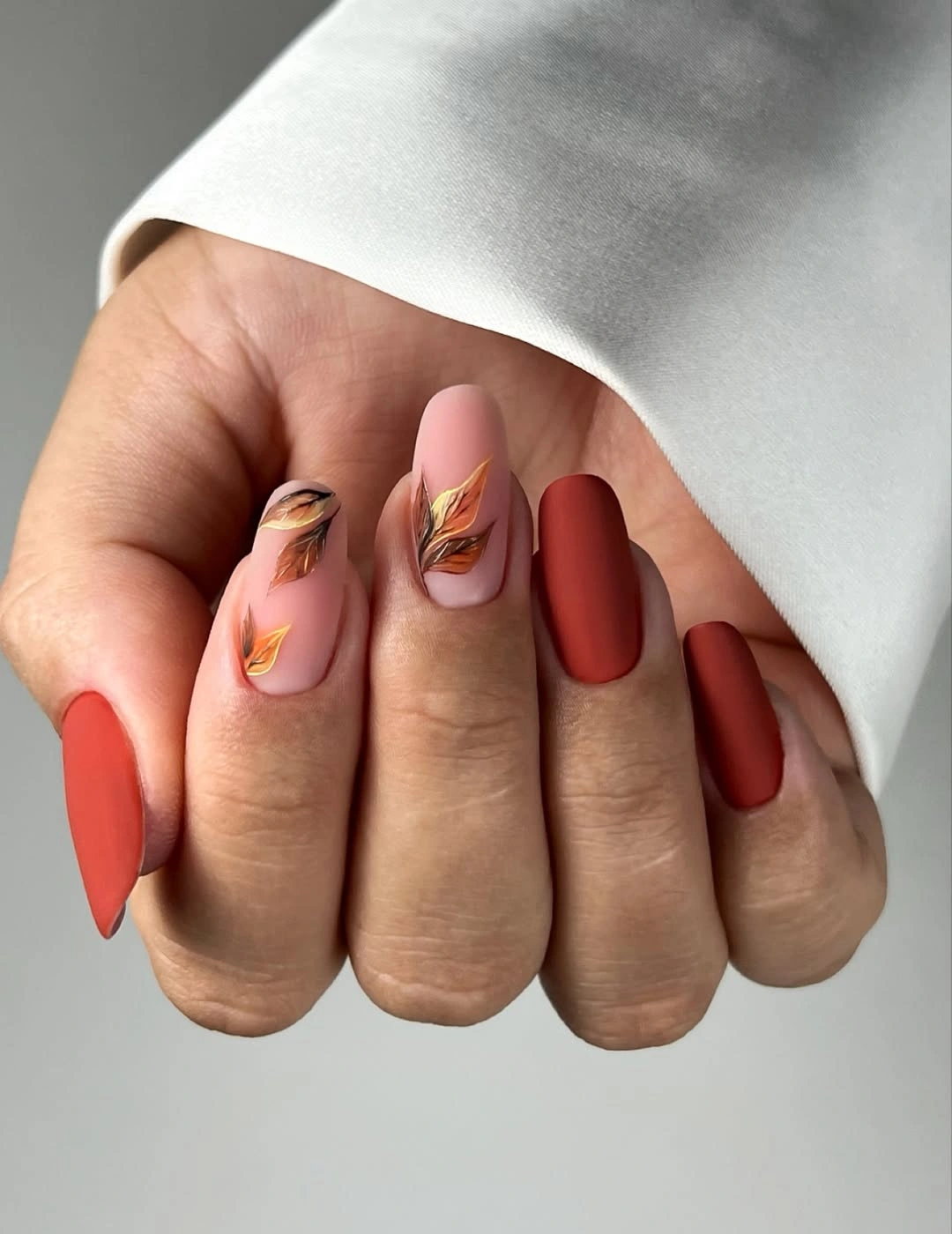 Rust coffin nails with mauve and tortoiseshell accents