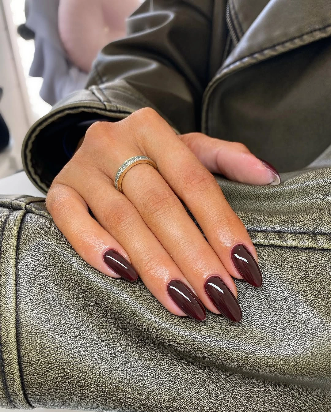 Burgundy almond nails with soft pink contrast