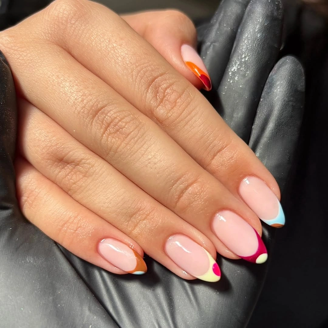 Medium almond nails with red orange white and dark tips