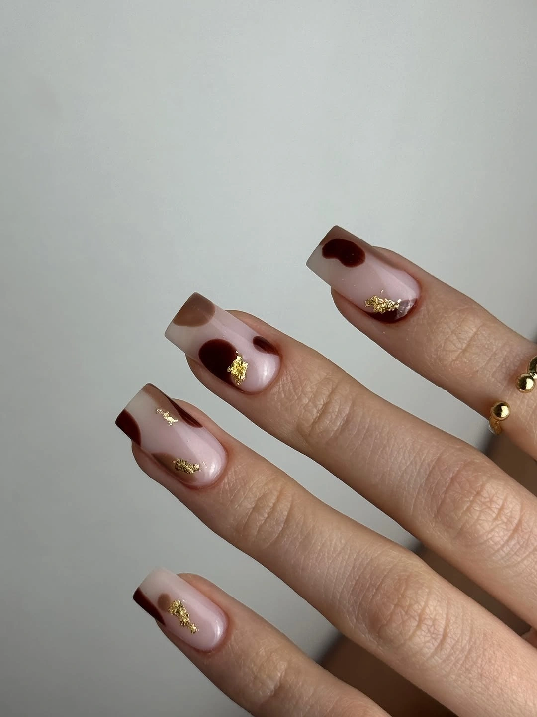 Medium square nails with chocolate white and gold tip blocks