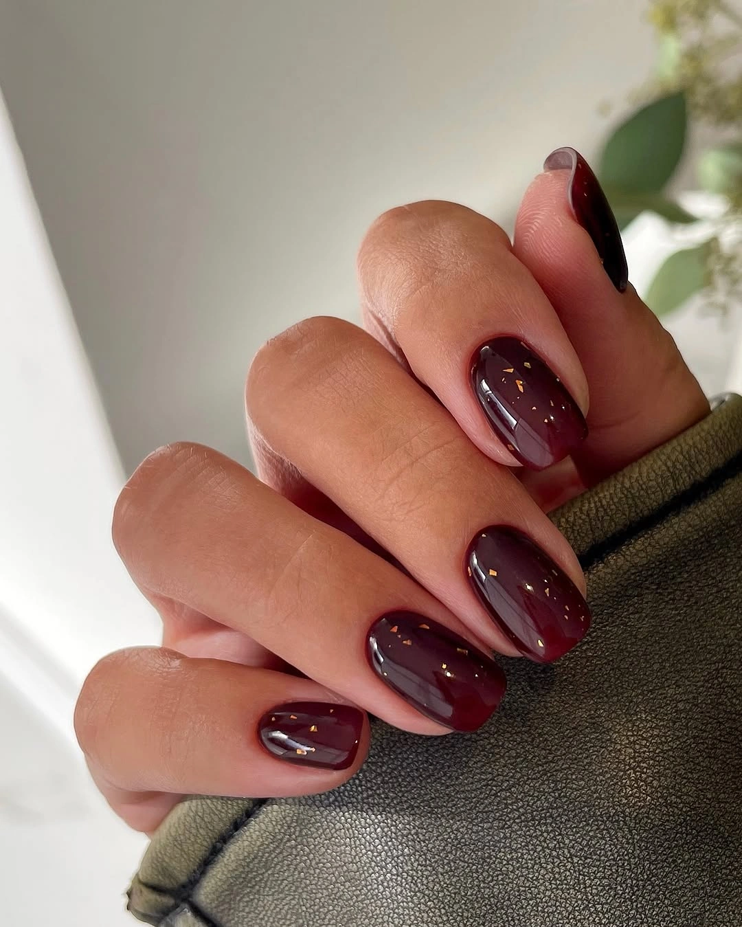 Medium almond nails with berry and plum color contrast