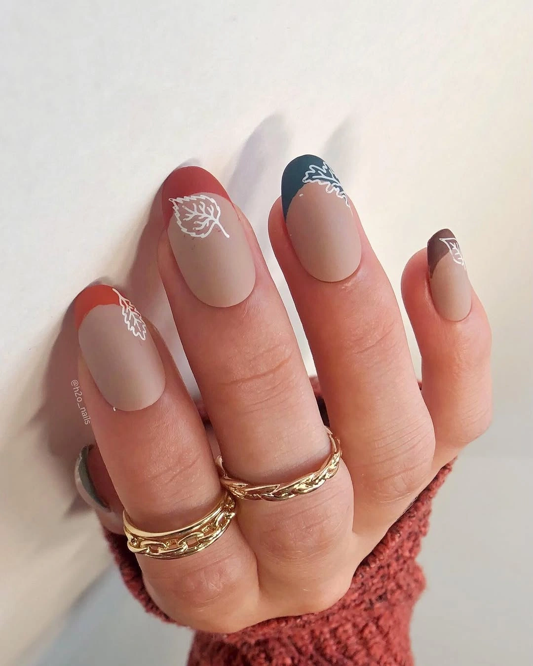 Dark angled French tips with fine white line art