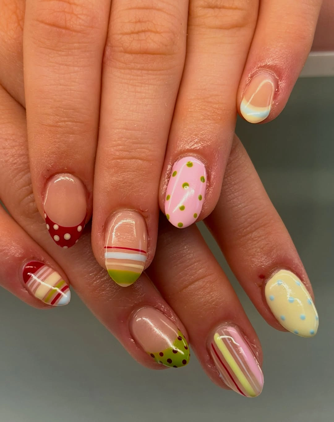 Mixed dot fall nails on sheer neutral base