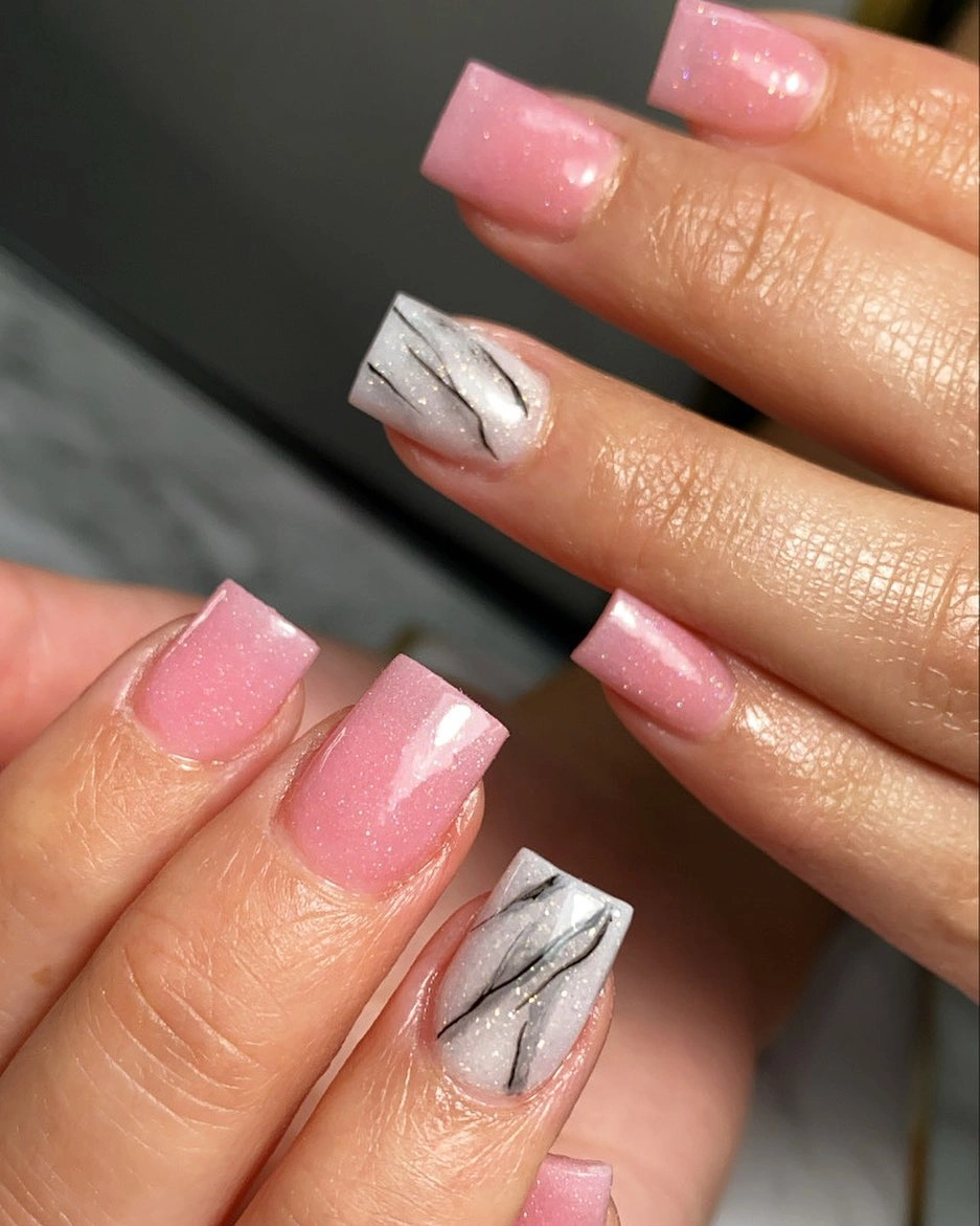 Medium square nails with bright pink and silver accent details