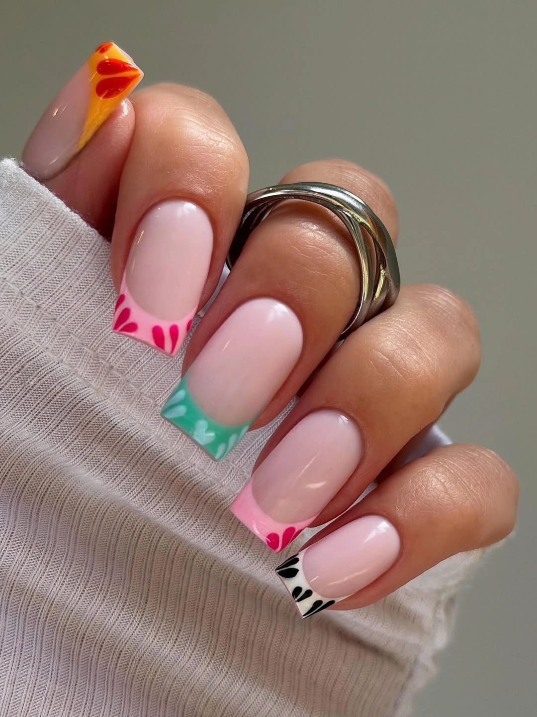 Medium square nails with colorful mismatched French tips