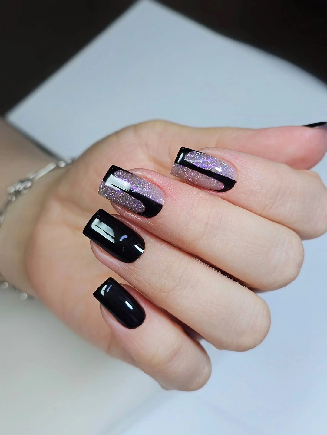 Medium square nails in milky white with subtle curved accents