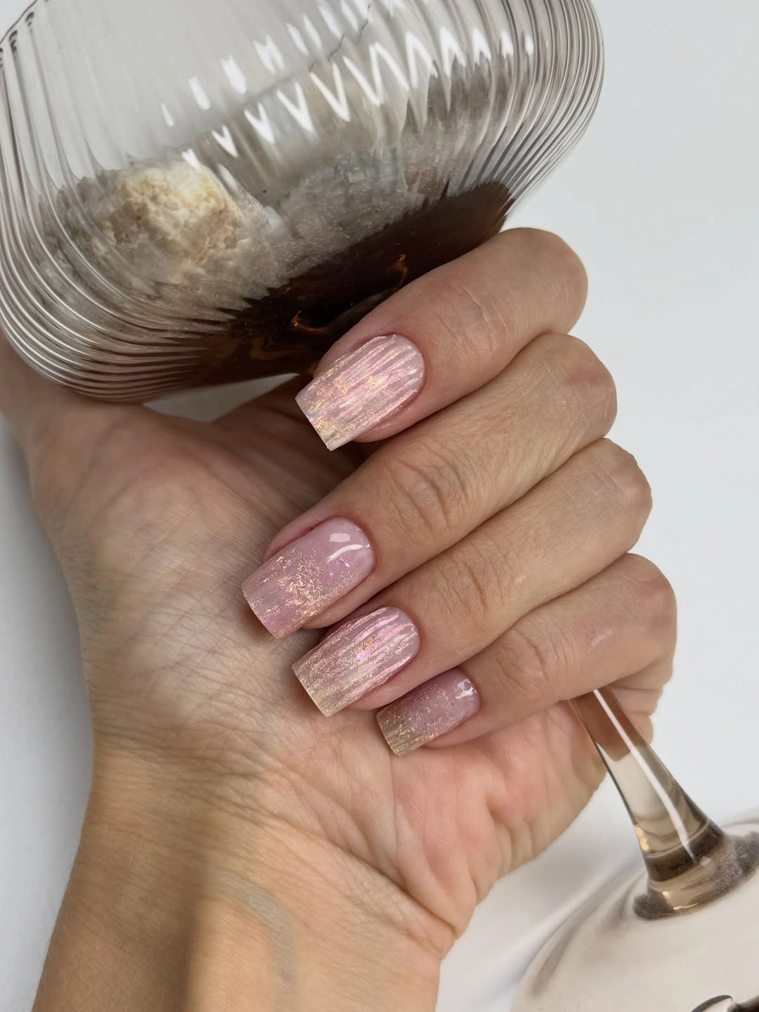 Medium square nails with mismatched green brown and striped tips