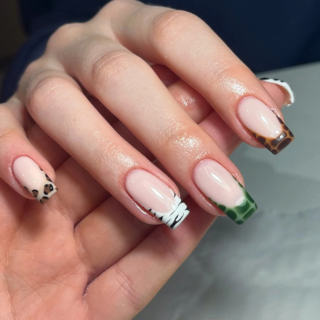 Short square nails with clean white French tips and pink bases