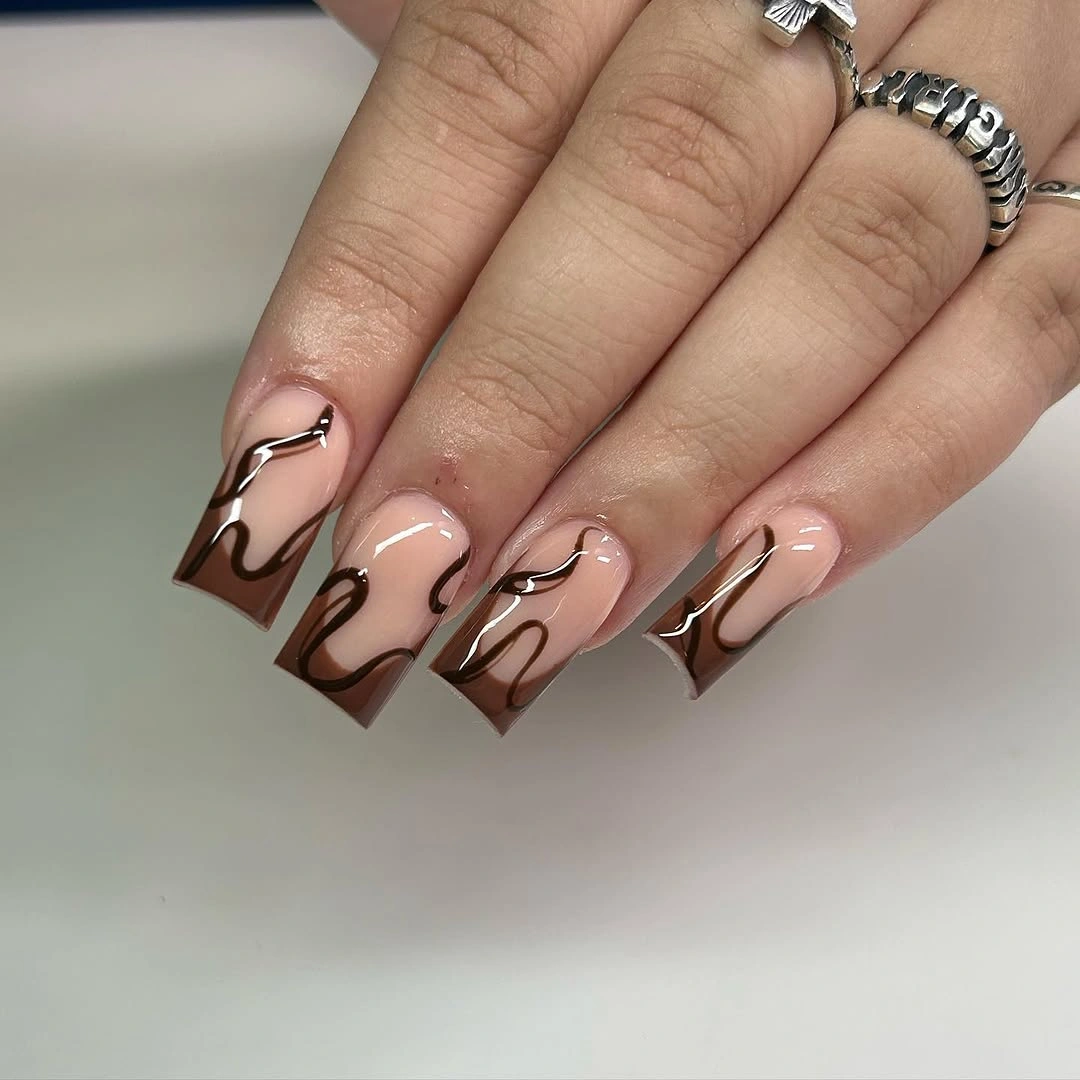 Short square nails in glossy creamy nude polish