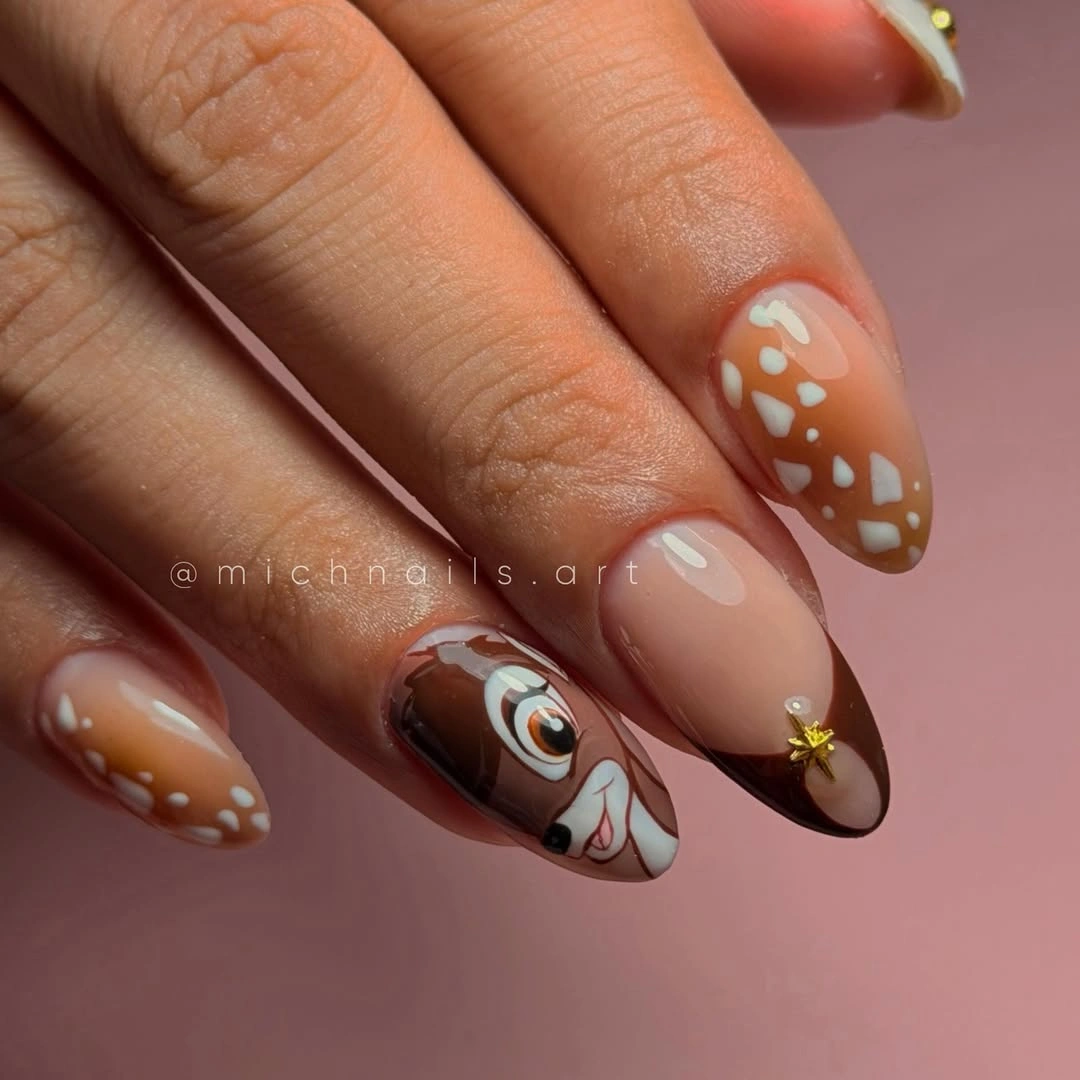 Brown almond nails with spotted woodland accent art