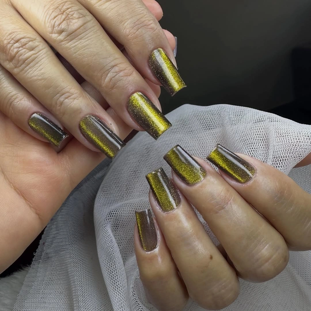 Medium square nails with cobalt blue yellow and nude geometry