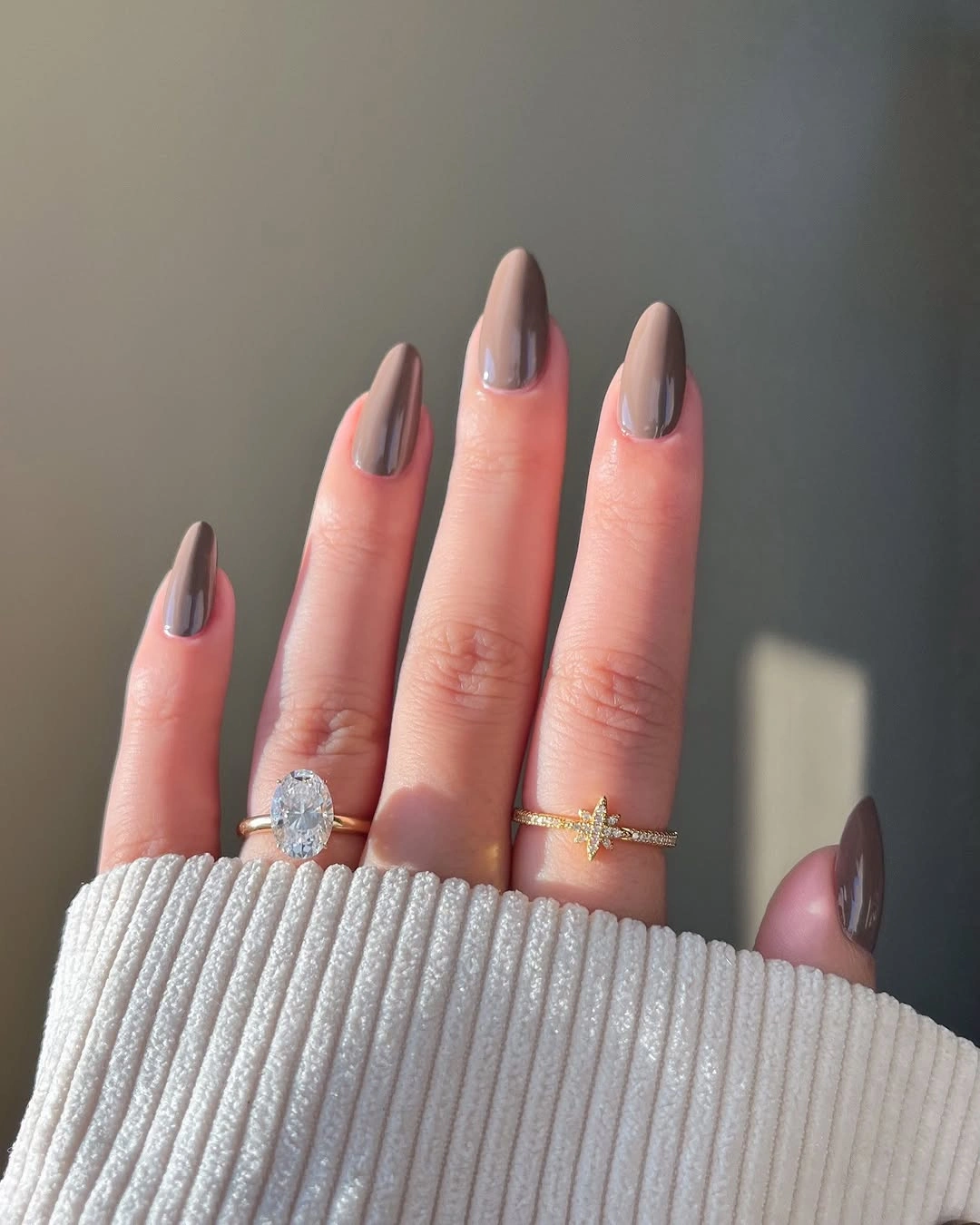 Short square nude nails with thin brown French tips