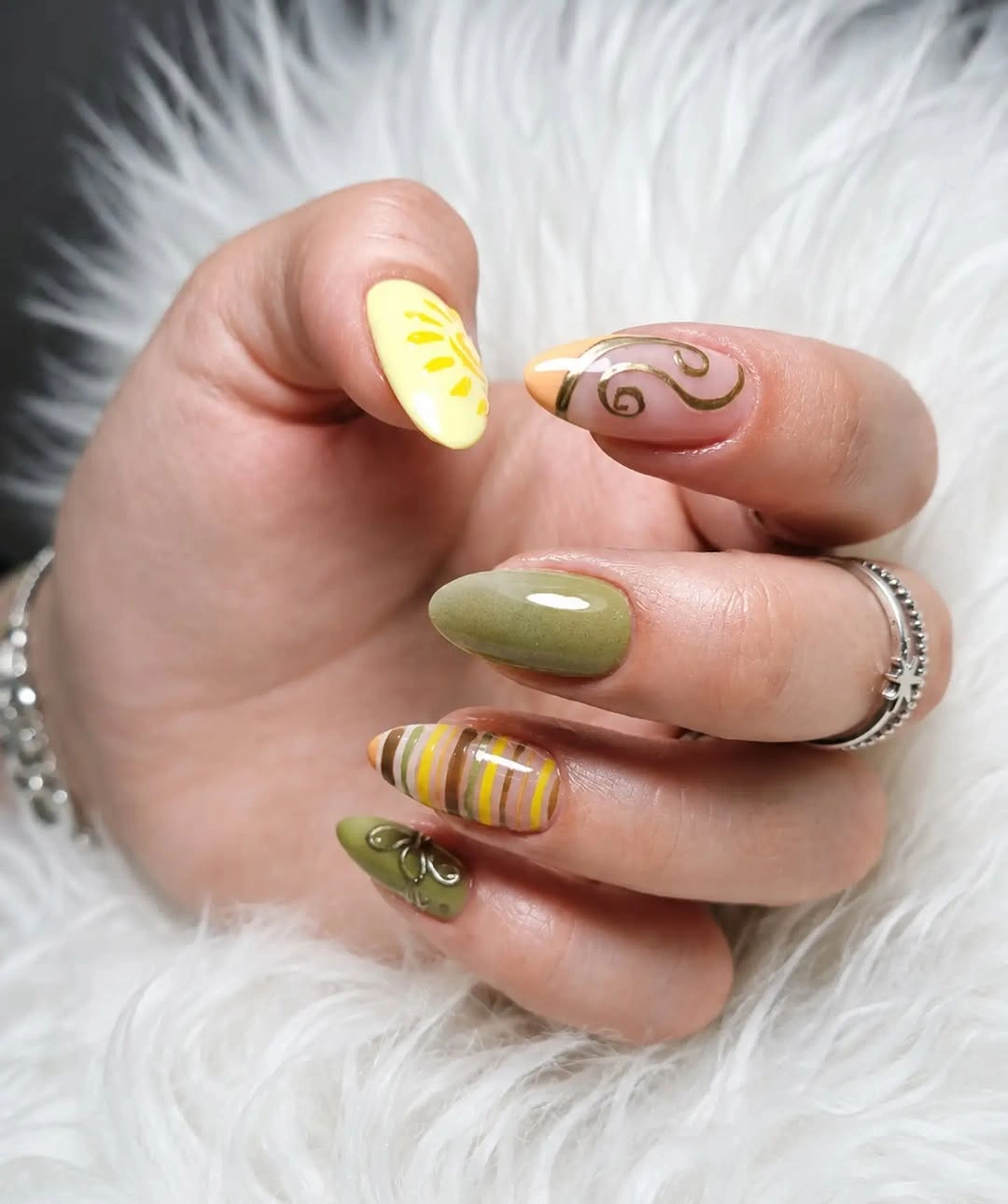 Long almond nails with burgundy brown mixed accents