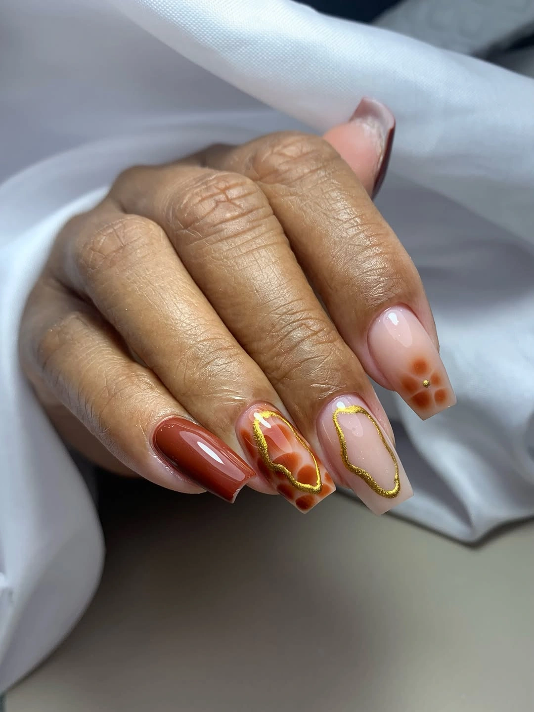 Medium square nails with chocolate brown French borders